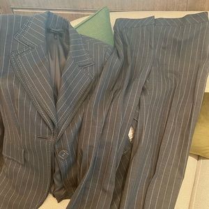 Women’s ESCADA pinstriped suit. Lightly worn. Very Chic and well-tailored.